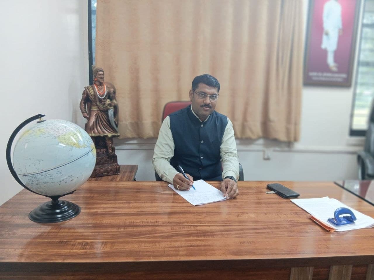 Dr. Balaji Aniruddha Ghadage — Principal